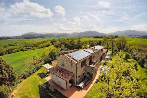 an aerial view of an old building in the countryside at Il Canneto Di Pomaia in Pomaia