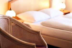 Łóżko lub łóżka w pokoju w obiekcie Hotel Górecki