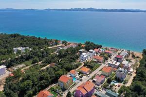 an aerial view of a town by the water at Luxury Villa Nada with Pool in Petrcane