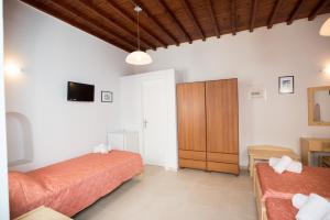 Postel nebo postele na pokoji v ubytování Florance Apartments & Rooms
