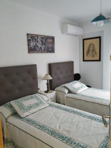 Postel nebo postele na pokoji v ubytování Habitaciones privadas Alicante centro
