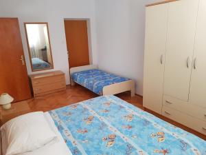 Postel nebo postele na pokoji v ubytování Maki & Suzi