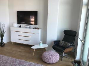TV a/nebo společenská místnost v ubytování schön gestrandet