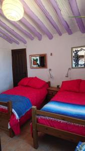 Tempat tidur dalam kamar di Mirador Del Vallejuelo