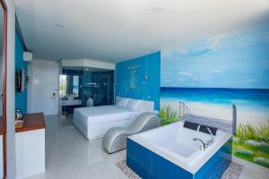 Postel nebo postele na pokoji v ubytování Romely Hotel Nha Trang