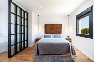Cama o camas de una habitación en Villa La Barrosa