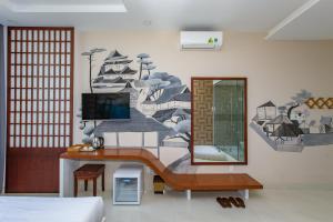 TV a/nebo společenská místnost v ubytování Romely Hotel Nha Trang + 37 fotografií