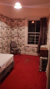 Postel nebo postele na pokoji v ubytování South Rakaia Hotel
