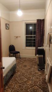 Postel nebo postele na pokoji v ubytování South Rakaia Hotel