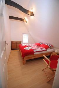 En eller flere senge i et værelse på Ferienwohnung Wildrose