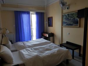 Postel nebo postele na pokoji v ubytování Hotel Miramare