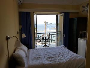 Postel nebo postele na pokoji v ubytování Hotel Miramare