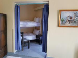 Postel nebo postele na pokoji v ubytování Hotel Miramare