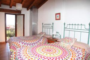 Posteľ alebo postele v izbe v ubytovaní Casa Rural - Al Alba