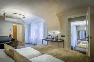 Letto o letti in una camera di Hotel Waldstein