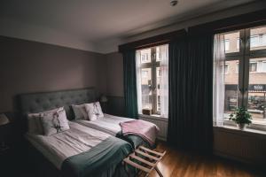 Voodi või voodid majutusasutuse Mojo Hotell toas