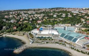an aerial view of a resort next to the water at NoAr Apartment Rijeka in Rijeka