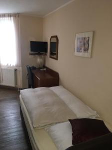 Postel nebo postele na pokoji v ubytování AltDüsseldorf