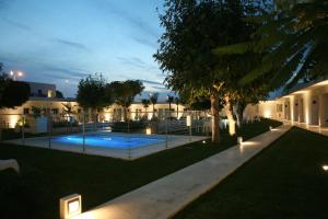 Bazén v ubytování Hostal Las Cumbres nebo v jeho okolí