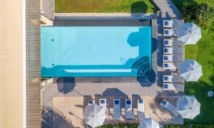 an overhead view of a swimming pool at a resort at Mellieha Holiday Centre in Mellieħa