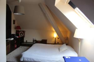 Postel nebo postele na pokoji v ubytování Chambres Privatives Chez l'Habitant
