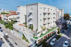 an overhead view of a white building on a city street at Hotel Villa Marina Wellness SPA in Rimini