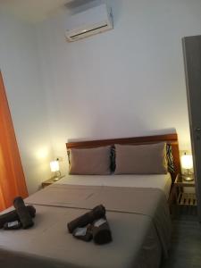Postel nebo postele na pokoji v ubytování CASAMINA