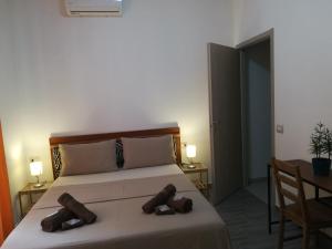 Postel nebo postele na pokoji v ubytování CASAMINA