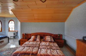 Кровать или кровати в номере Ferienhaus Bodensee Seeblick