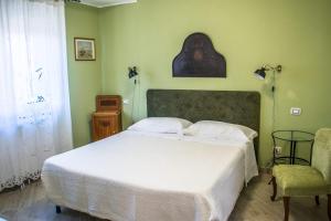 Postel nebo postele na pokoji v ubytování B&B Fleurs