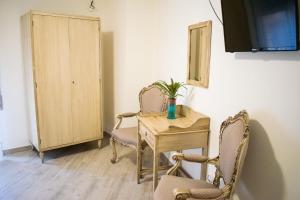 TV a/nebo společenská místnost v ubytování B&B Fleurs