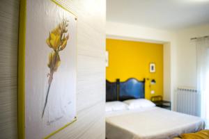 Postel nebo postele na pokoji v ubytování B&B Fleurs