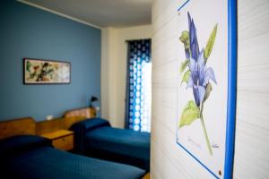 Postel nebo postele na pokoji v ubytování B&B Fleurs