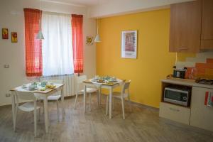 Kuchyň nebo kuchyňský kout v ubytování B&B Fleurs