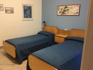 Postel nebo postele na pokoji v ubytování B&B Fleurs