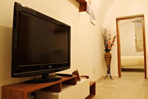 TV a/nebo společenská místnost v ubytování B&B La Campanella