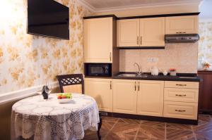 Kuchyňa alebo kuchynka v ubytovaní Apartmány Kord