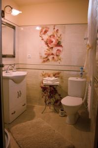 Koupelna v ubytování Apartmány Kord + 30 fotografií