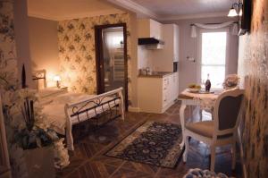 Posteľ alebo postele v izbe v ubytovaní Apartmány Kord