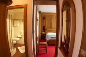 Koupelna v ubytování Hotel Catinaccio