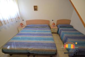 Postel nebo postele na pokoji v ubytování Villa Sofia