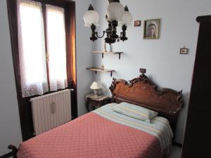 Ένα ή περισσότερα κρεβάτια σε δωμάτιο στο Casa Giuliano