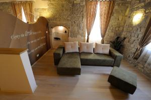 Posezení v ubytování Desiderata Studio Apartment