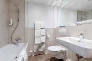 Kúpeľňa v ubytovaní Hotel IMLAUER & Bräu