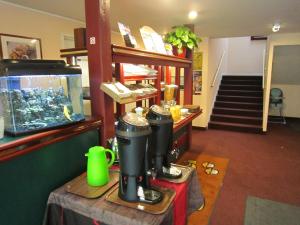a room with a fish tank on a table at Quick Palace Nantes La Beaujoire in Nantes