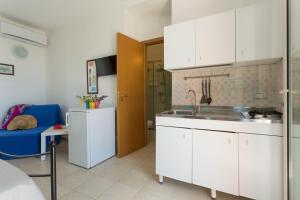 Una cocina o kitchenette en Al Ficodindia