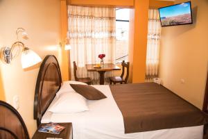 Televiisor ja/või meelelahutuskeskus majutusasutuses HOSTAL MILAGROS INN - samary inn