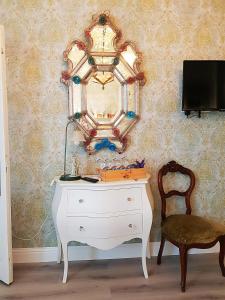 TV a/nebo společenská místnost v ubytování Miglioranzi Rooms