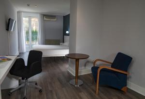 TV a/nebo společenská místnost v ubytování Hotel Gran Regente