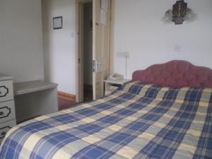 Postel nebo postele na pokoji v ubytování Sancta Maria Hotel